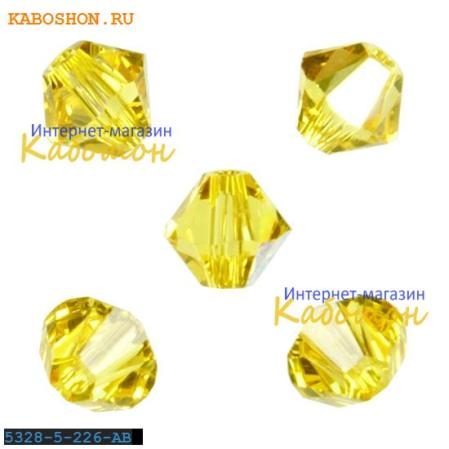 Swarovski Xilion beads 5 мм Light Topaz AB